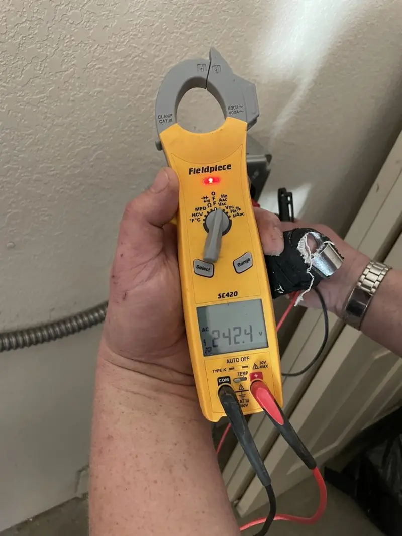 Voltage testing with clamp meter during Circuit Breaker Repair in Greencastle